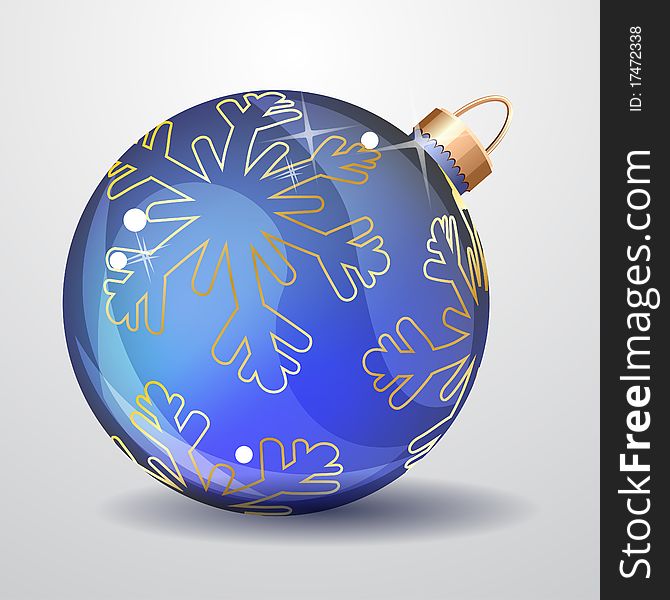 Glass Christmas ball with contour snowflakes lies. Glass Christmas ball with contour snowflakes lies