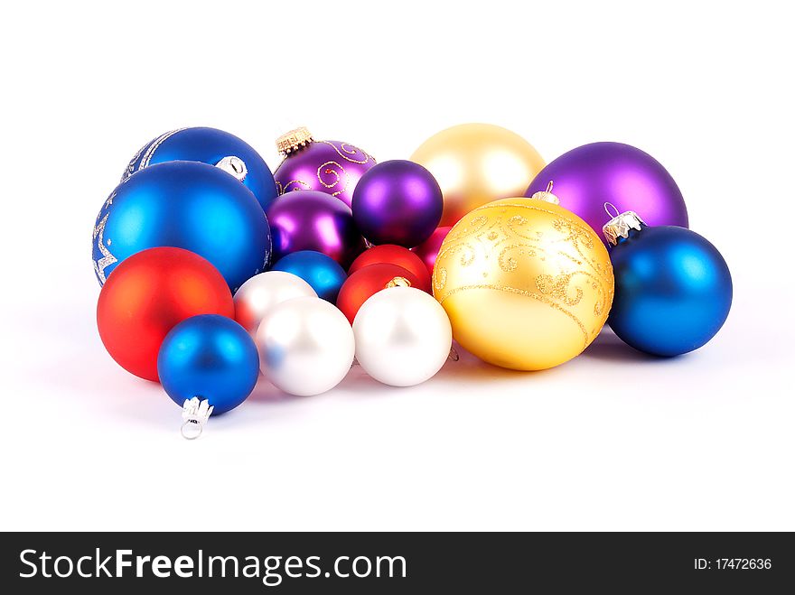 Multi-colored Christmas balls isolated on a white background