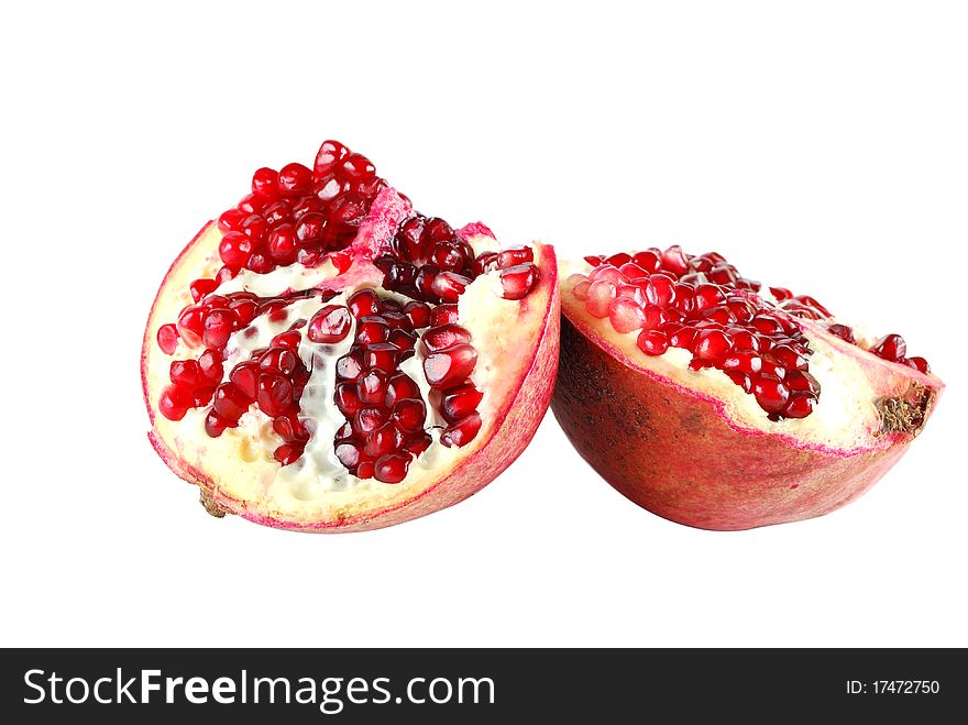 Half of pomegranate on a white background