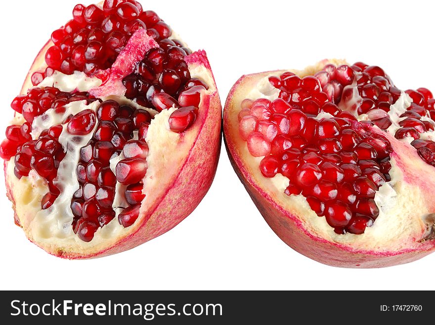 Half of pomegranate on a white background