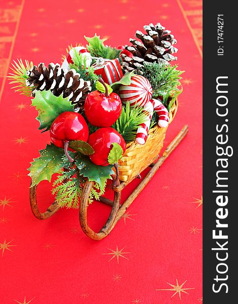 Decorative sleigh with colorful Christmas ornaments and gifts. Decorative sleigh with colorful Christmas ornaments and gifts