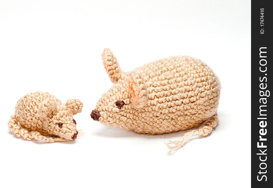 Crochetted handmade toy mice family.