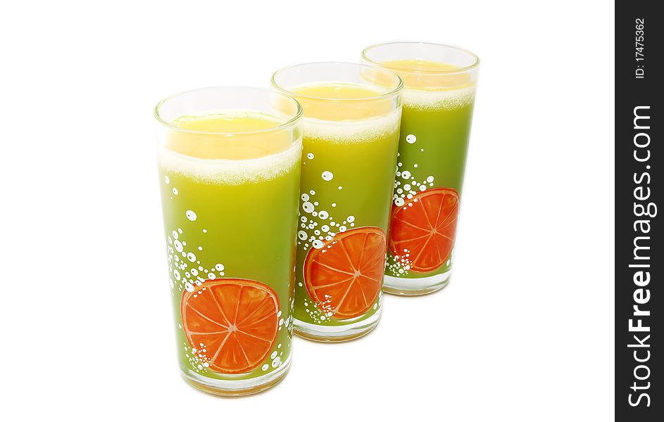 Three green glasses of citrus orange juice isolated. Three green glasses of citrus orange juice isolated