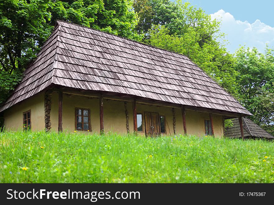 The wooden house located on the fringe of the forest. The wooden house located on the fringe of the forest.