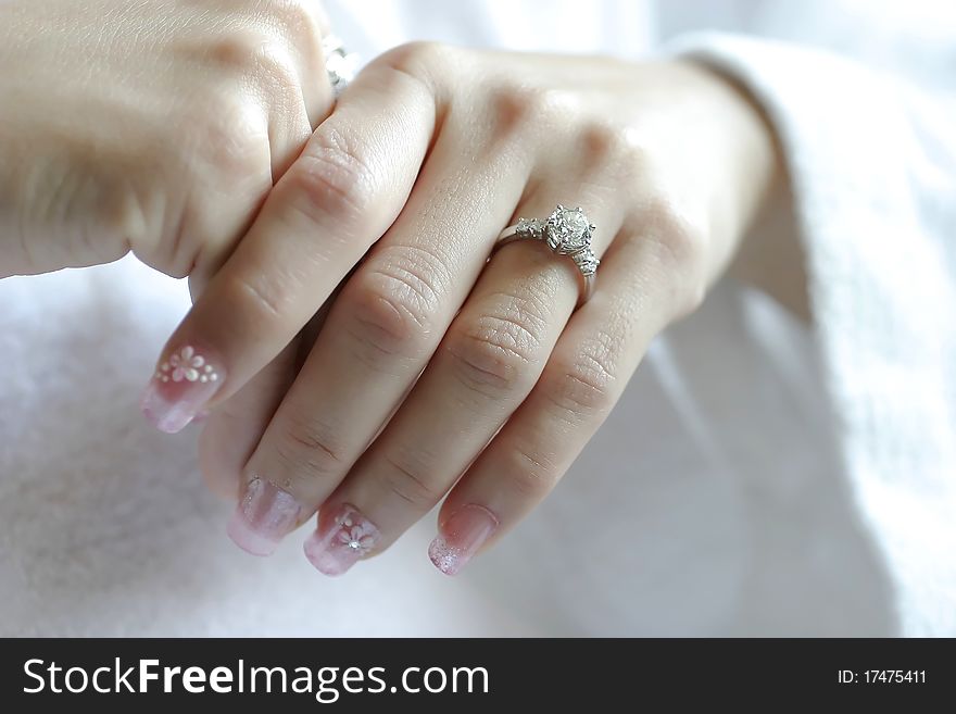 Wedding rings on hands of bride and groom, focus on rings. Wedding rings on hands of bride and groom, focus on rings