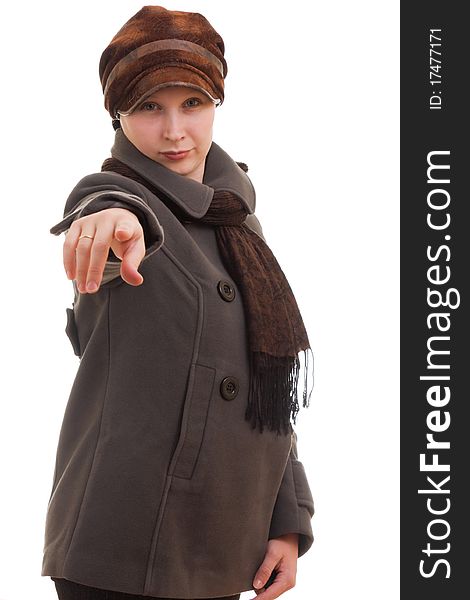A girl in winter clothes on a white background.