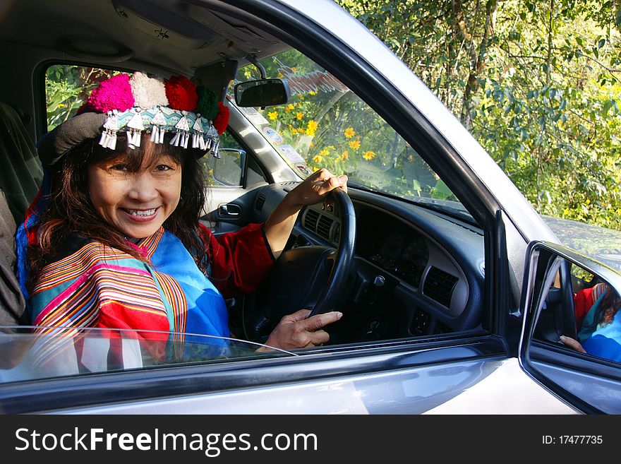 Lisu hill tribe woman smile deiving car. Lisu hill tribe woman smile deiving car