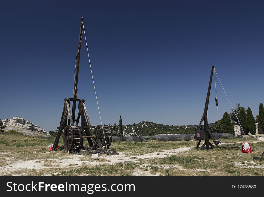 Two trebuchets as the part of the exhibition of siege machines situated in the castle Les Baux de Provence, France. Two trebuchets as the part of the exhibition of siege machines situated in the castle Les Baux de Provence, France.