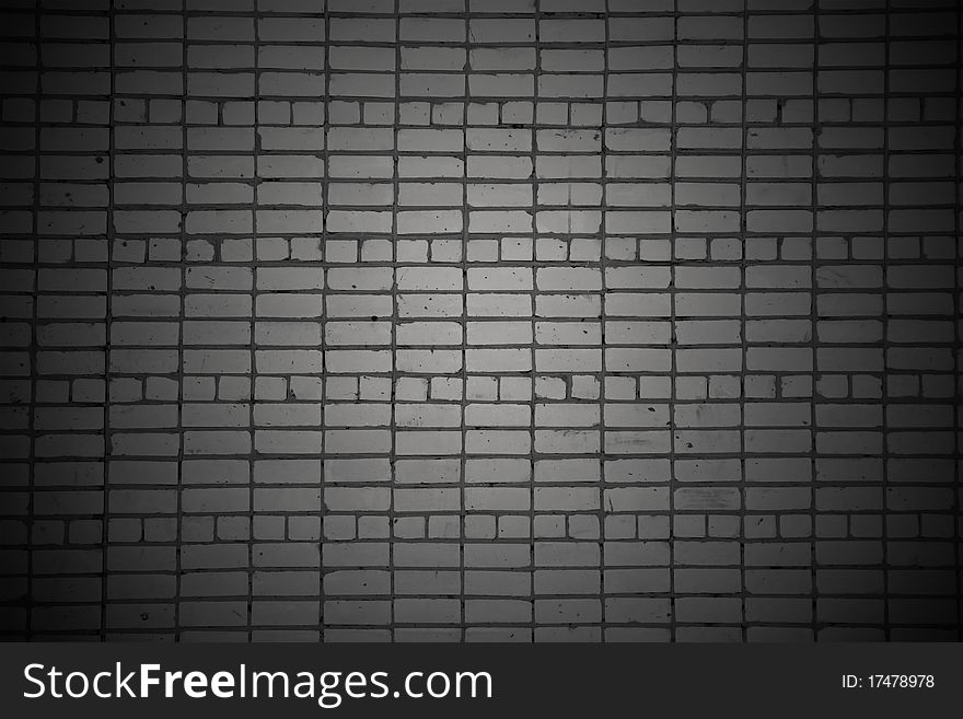 Old dark brick wall background