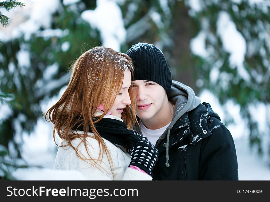 Guy And The Girl Enjoy Winter Walk