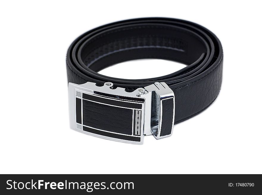 Leather belt with metal buckle isolated on white background