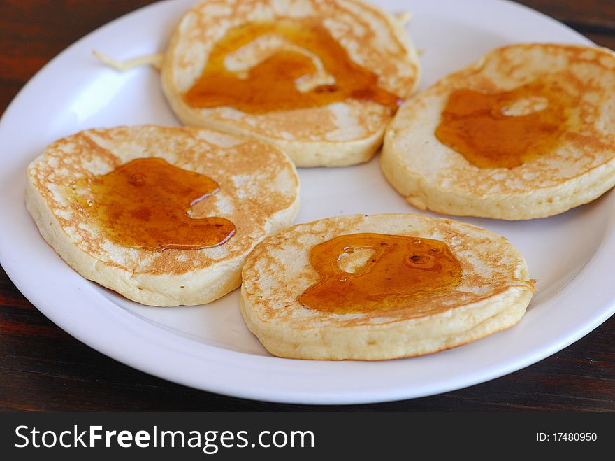 A plate filled with flap jacks