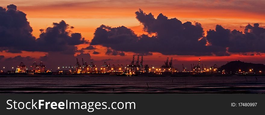 Container port silhouette taken at Shekou Port, Shenzhen, China. Container port silhouette taken at Shekou Port, Shenzhen, China.