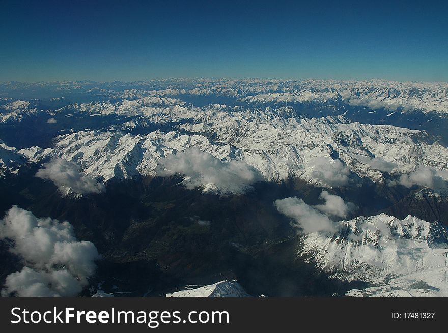I photo the alps mountain in the airplane. It is great and gorgeous.