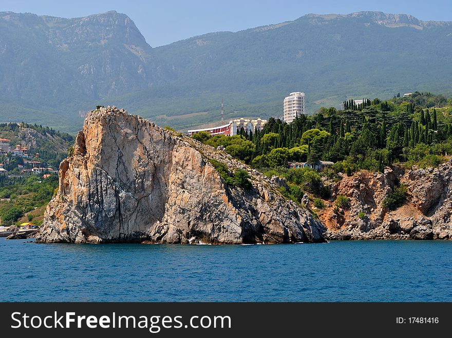 Black sea coast and small rock. Black sea coast and small rock