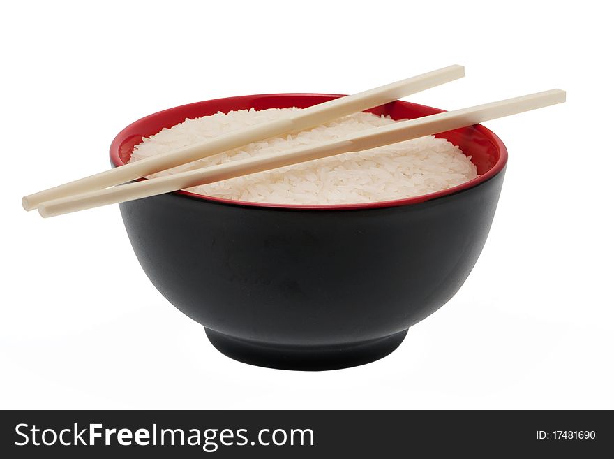 Rice, bowl with chopsticks isolated against white background