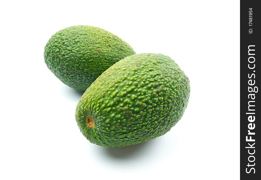 Avocados on white background with shadow