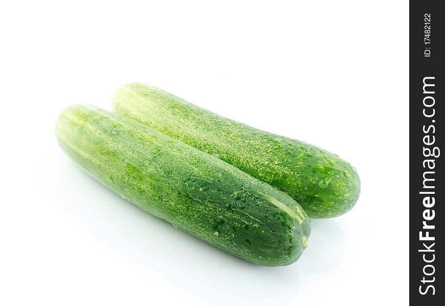 Two cucumbers on white background