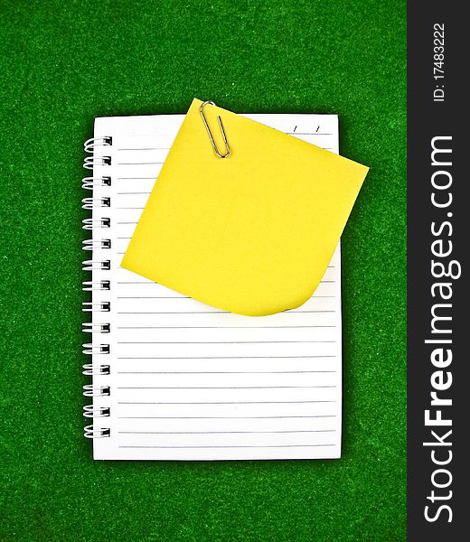 Yellow note and notebook Paper