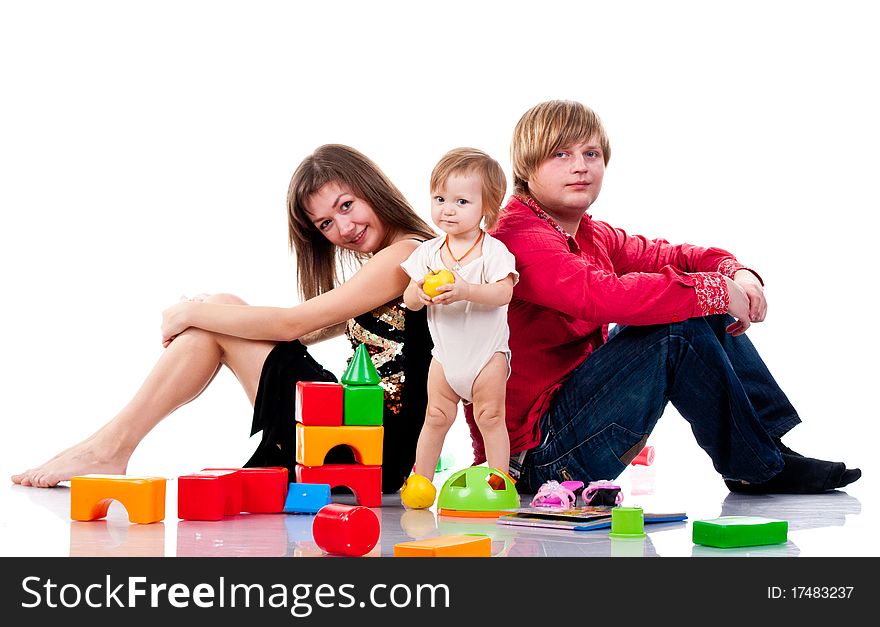 Family playing with toys isolated on white