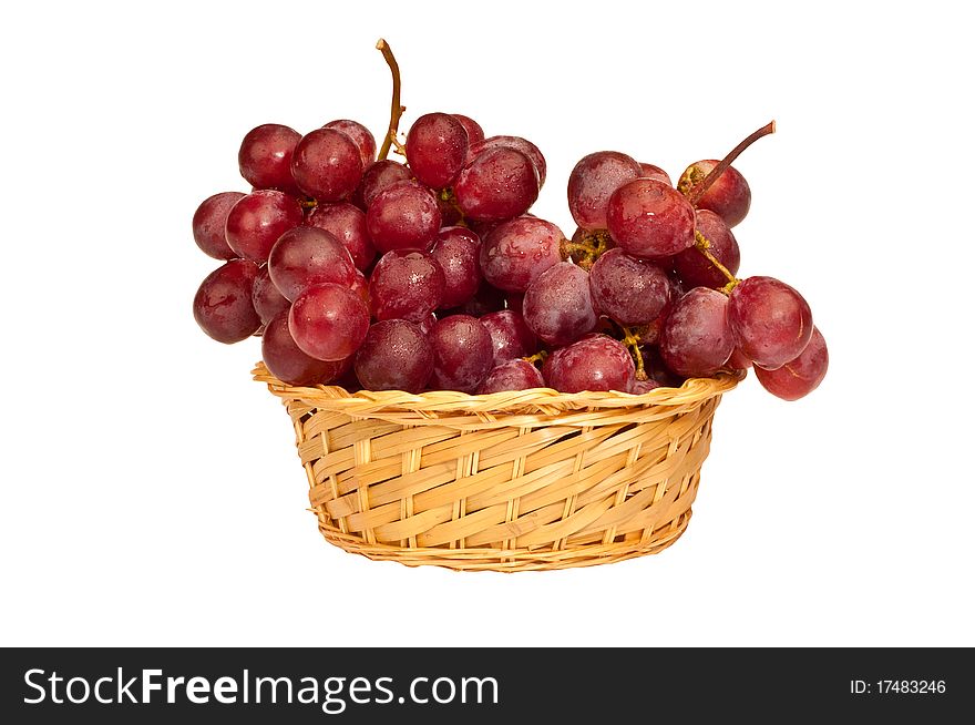 Red grapes is in the basket