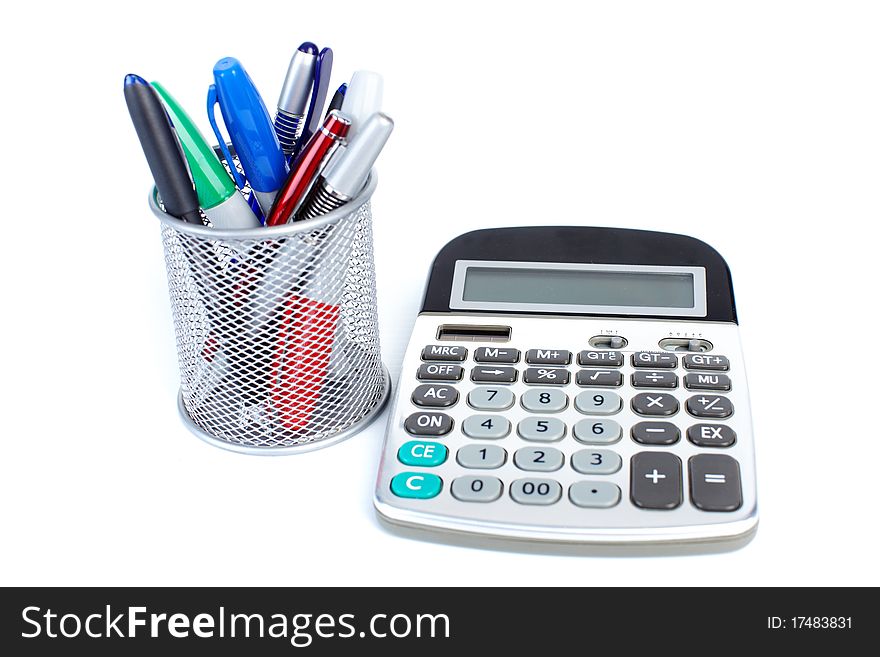 The calculator and pen on a white background