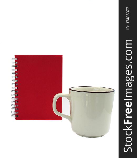 Red note book and coffee on the white background