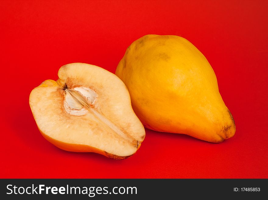 Yellow quinces in isolated on background. Yellow quinces in isolated on background