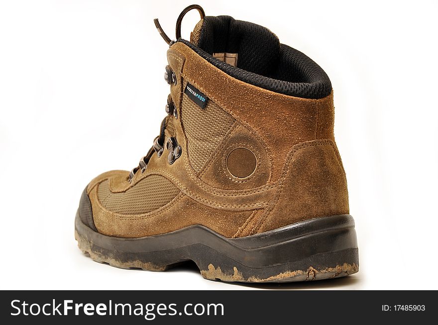 Trekking shoes and a white background