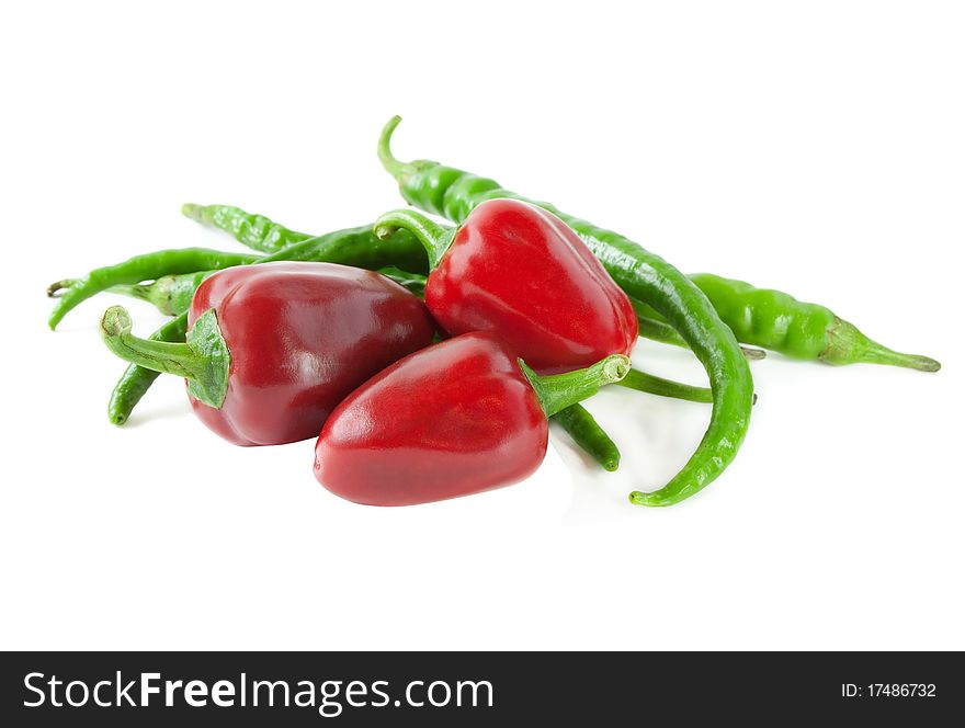 Red and green hot pepper isolated on white