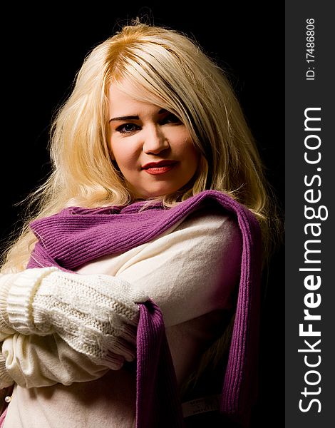 Photo of blond smiling woman with violet scarf