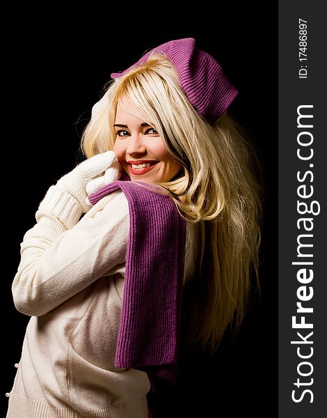 Photo of blond smiling woman with violet scarf