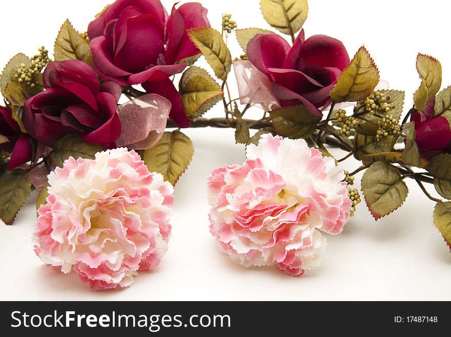 Carnations and branch with red roses. Carnations and branch with red roses