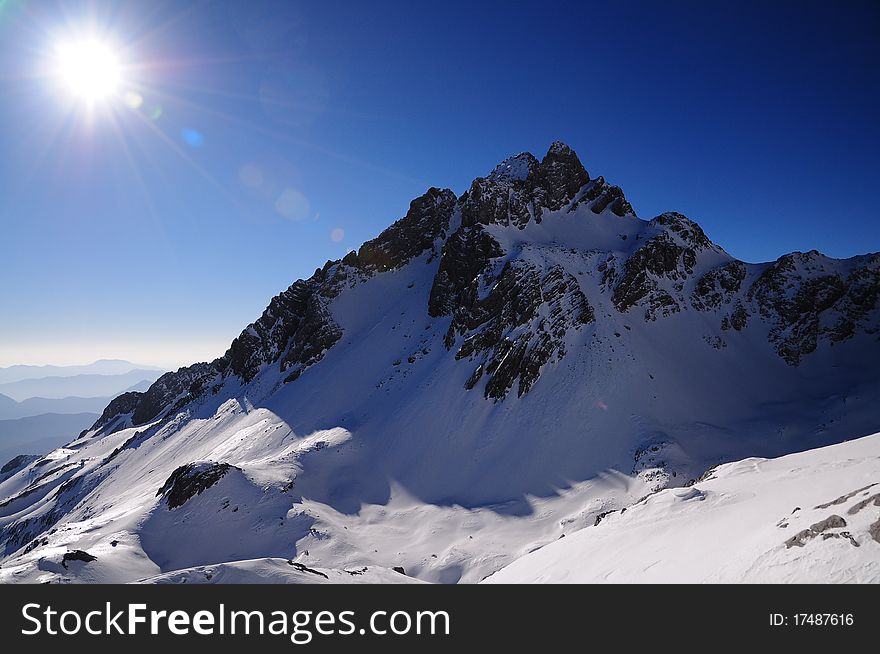 The jade dragon snow mountain peaks. The jade dragon snow mountain peaks