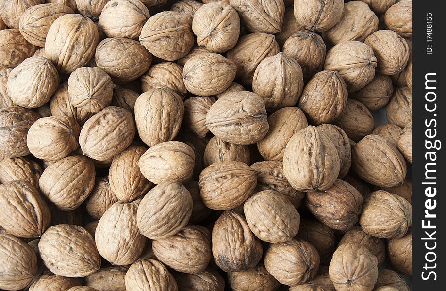 Stacked walnut, fruit background, walnut