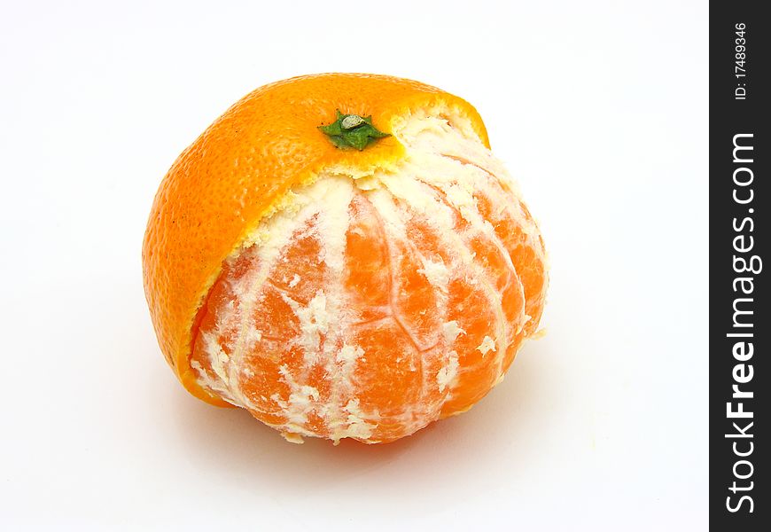 Ripe tangerines lie on a white background