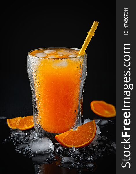 Fresh Orange Juice Against Black Background