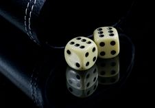 Two Dice On Black Stock Photo