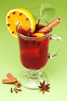Glass Of Mulled Green On A Green. Stock Photos Glass Of Mulled Green On A Green. Stock Photos