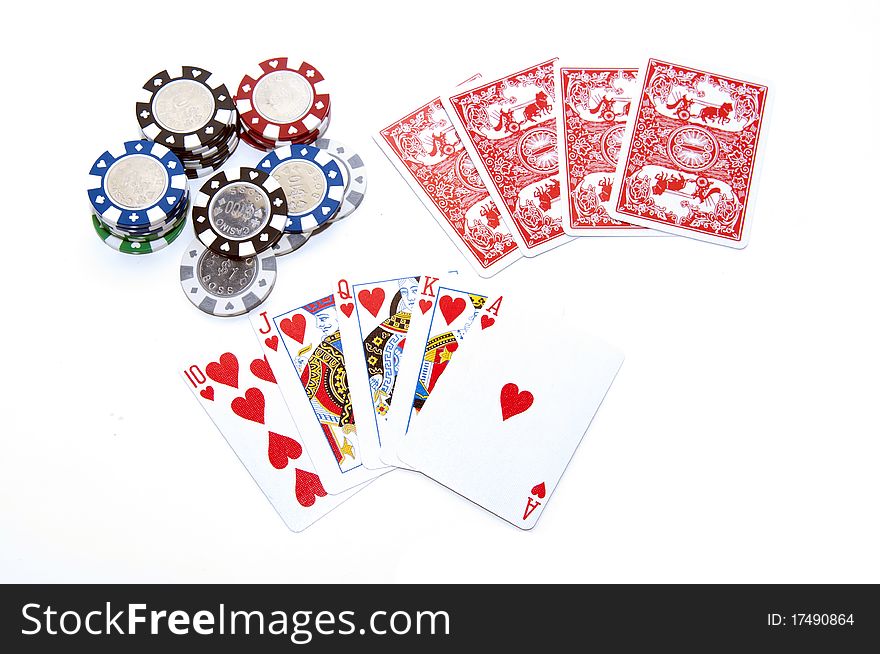 Poker royal flush with chips on white background