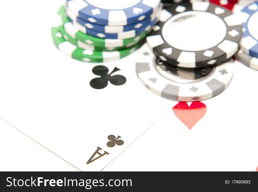 Aces with poker chips on white background