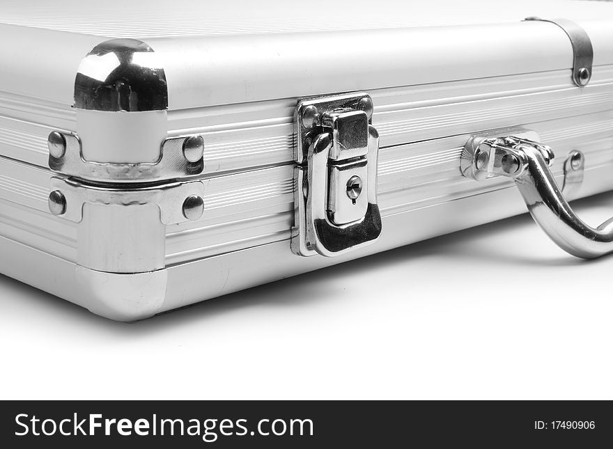 A silver briefcase on a white background. Close-up