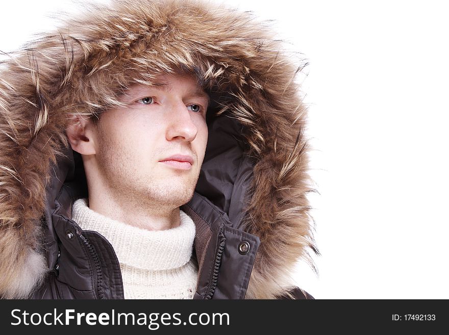Young man wearing winter jacket isolated over white