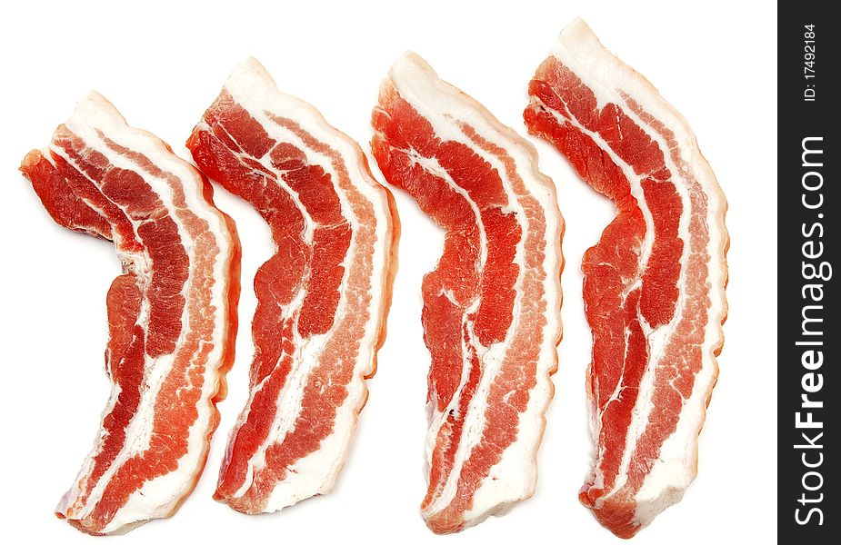 Chunks of raw meat on a white background