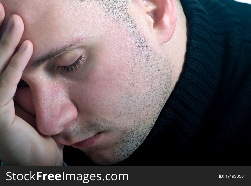 Young Businessman Deeply Sunk in Thoughts. Young Businessman Deeply Sunk in Thoughts