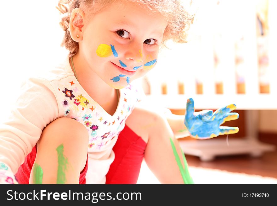 Girl With Paint Hands Isolated On White