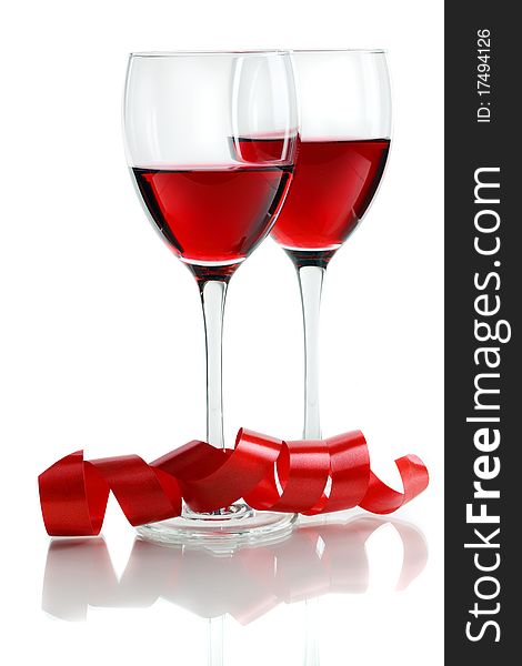 Glass of red wine on a white background and with soft shadow