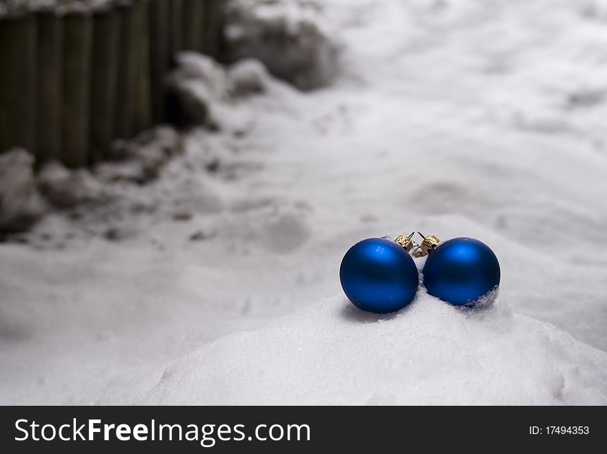 Christmas decoration on the snow. Photo taken outside, on December 2010. Christmas decoration on the snow. Photo taken outside, on December 2010.