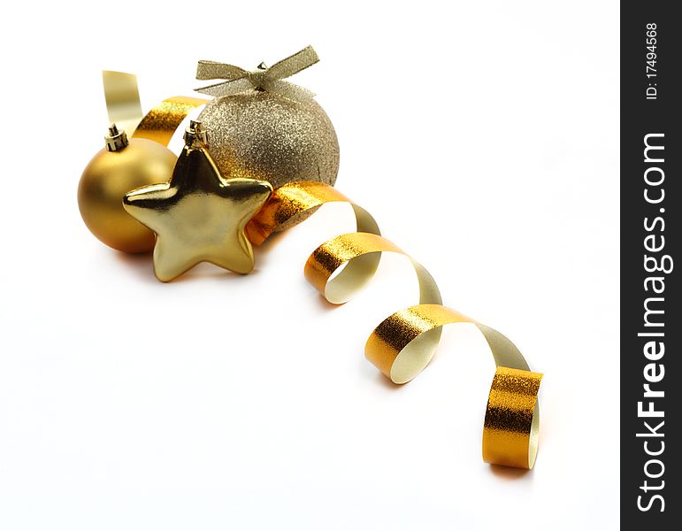 Christmas golden balls hanging with ribbons on white background. Christmas golden balls hanging with ribbons on white background