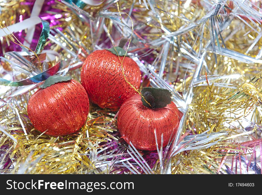 Christmas ornament with toys in shape of apples. Christmas ornament with toys in shape of apples